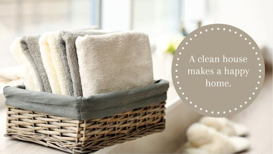 Basket with towels and a clean home quote