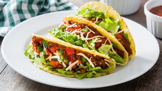 Tacos on a white plate