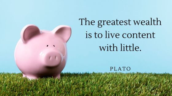 Piggy bank on grass with a Plato quote