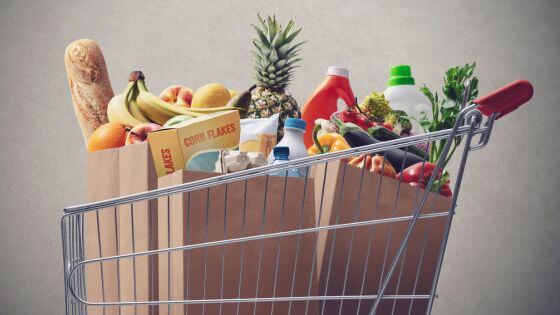 Bagged groceries in grocery cart