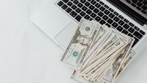 Money on laptop