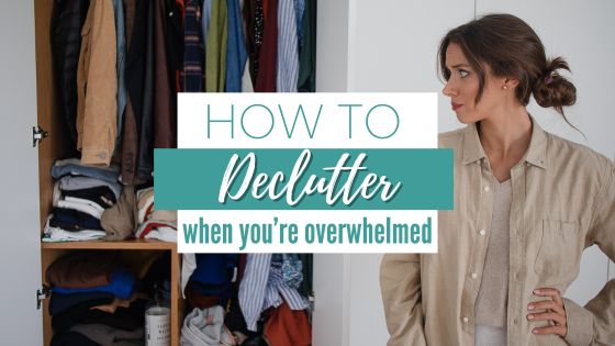 Woman Overwhelmed with Decluttering Her Closet