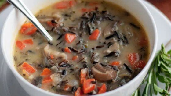 Wild mushroom and rice soup in bowl