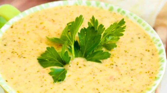 broccoli cheddar soup in white bowl