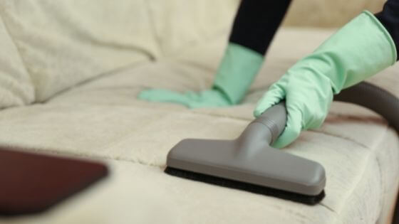 vacuuming couch