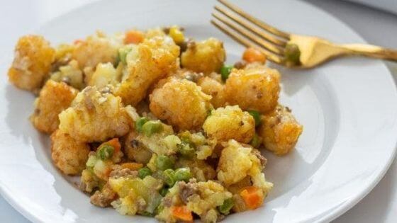 Tater Tot Casserole on White Plate with Fork