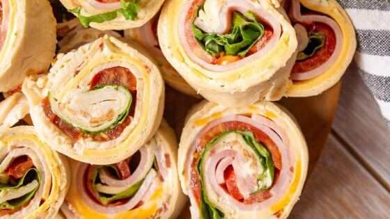 pinwheel sandwich with meat, cheese and vegetables