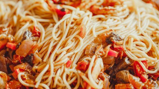 Angel hair pasta with spaghetti sauce and diced tomatoes 