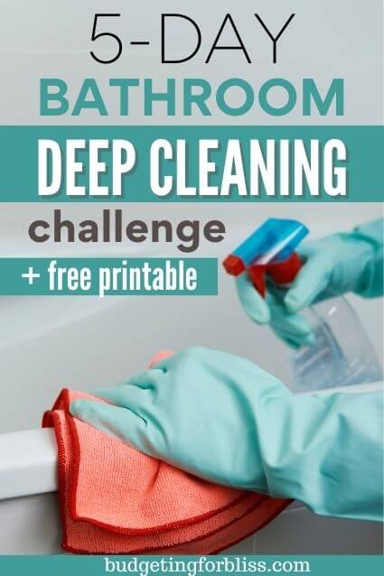 Cleaning bathroom tub with microfiber cloth and spray cleaner