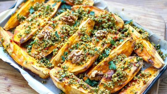 Roasted sweet potatoes on white baking dish