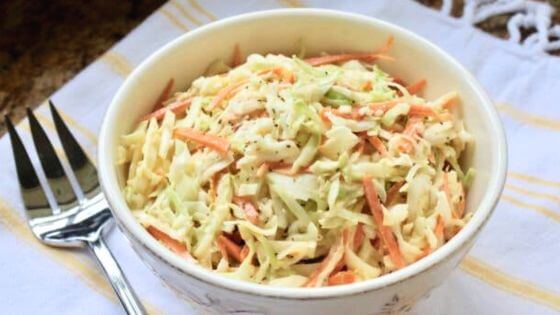 Spicy coleslaw in white bowl