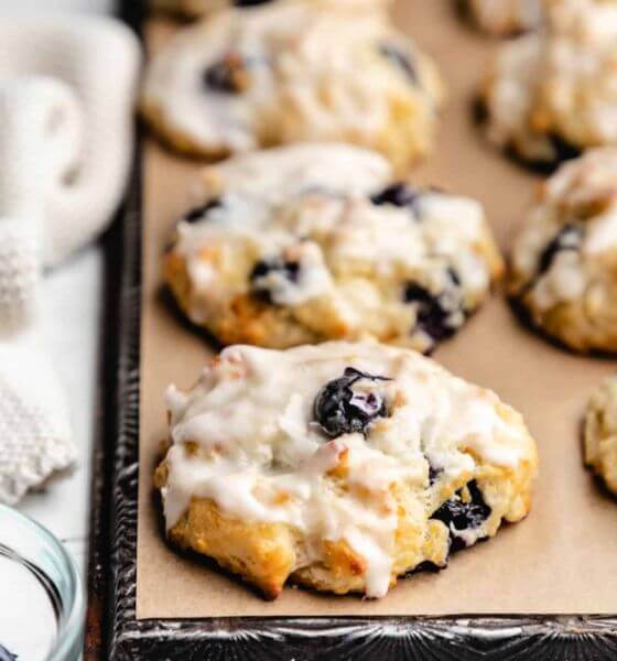 Blueberry biscuits on baking pan