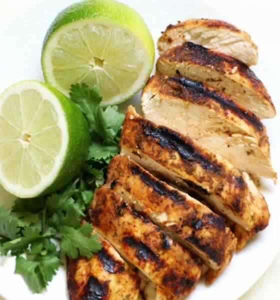 Chili Lime Grilled Chicken on White plate with slice of lime