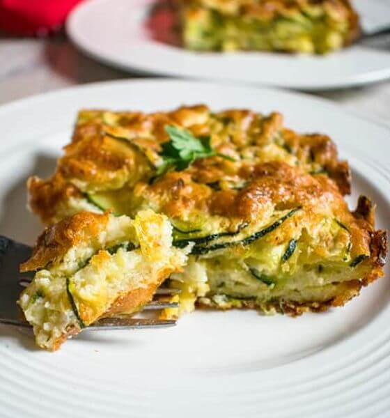 Cheese and Zucchini Bake on White Plate for Potluck