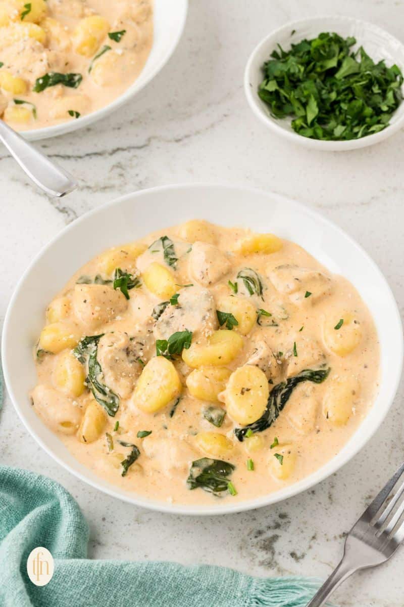 Chicken gnocchi in white bowl