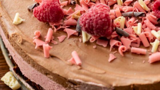 Chocolate raspberry mousse cake with raspberries on top