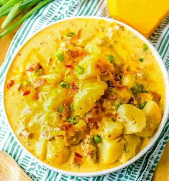 Bacon cheeseburger soup in white bowl