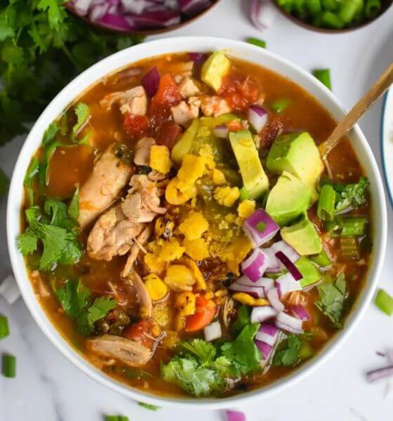 crockpot green chili chicken soup in white bowl