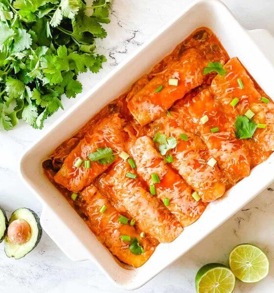 Slow Cooker Enchiladas in White Baking Dish