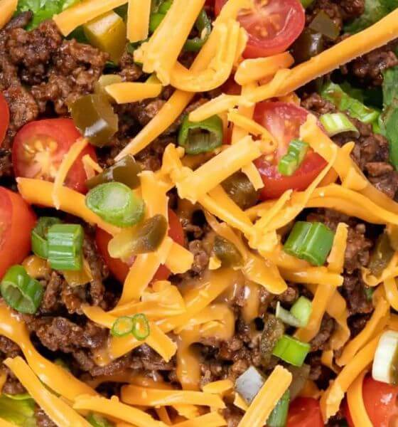 Nachos with cheese ground beef and tomatoes
