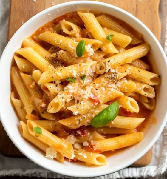 Pasta and sauce in white bowl