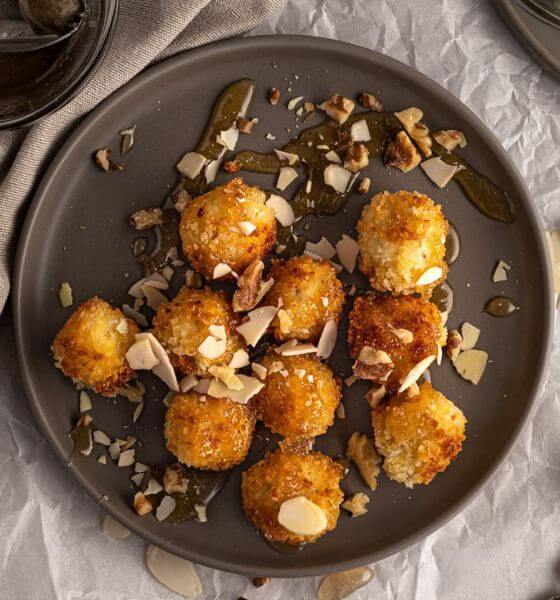 Croquettes on grey round dish for a Thanksgiving appetizer
