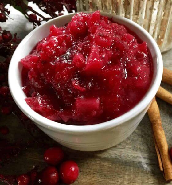 cranberries and pear sauce in white bowl