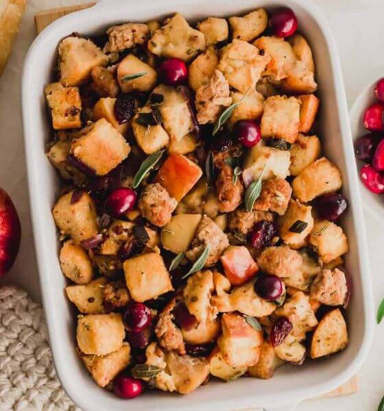 Stuffing with cranberries in white baking dish