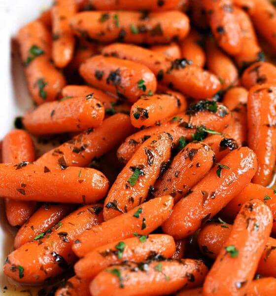 Glazed carrots in white dish