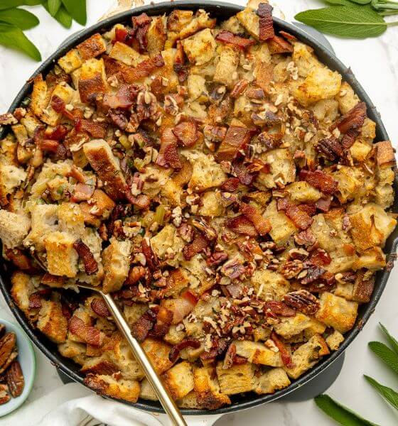 Sourdough stuffing with bacon in black skillet