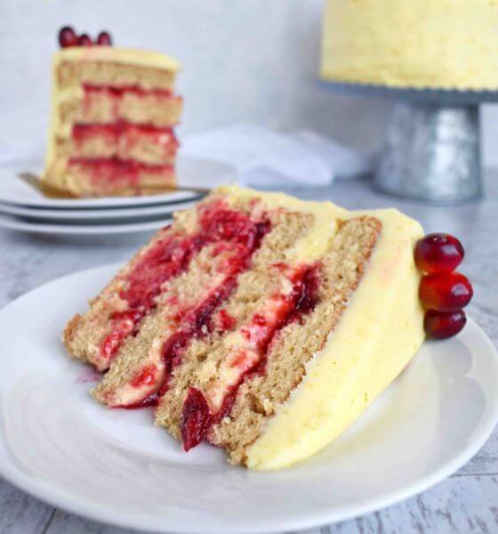 Cranberry orange cake on white plate