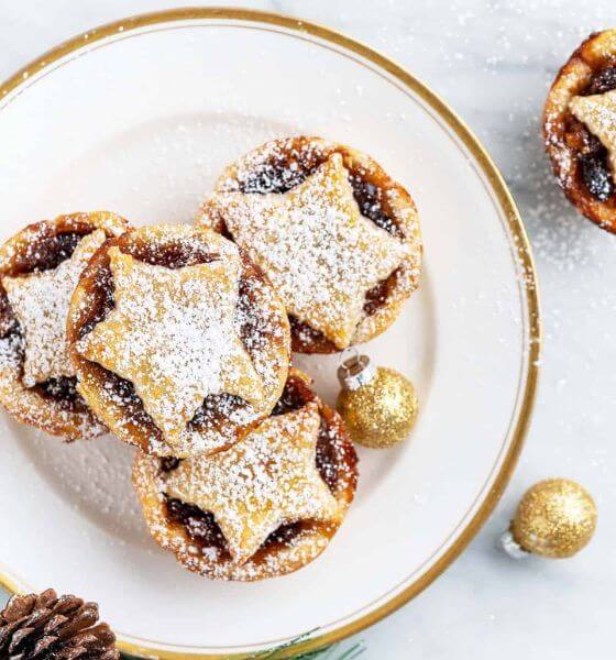 Mincemeat tarts on a white and gold plate