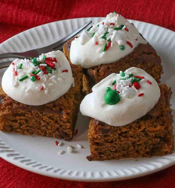 Pumpkin gingerbread blondies on a white plate