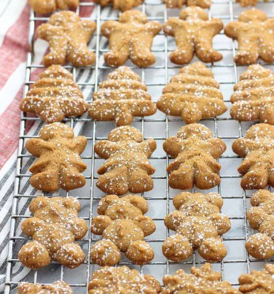 Gingerbread spritz cookies on wire baking rack