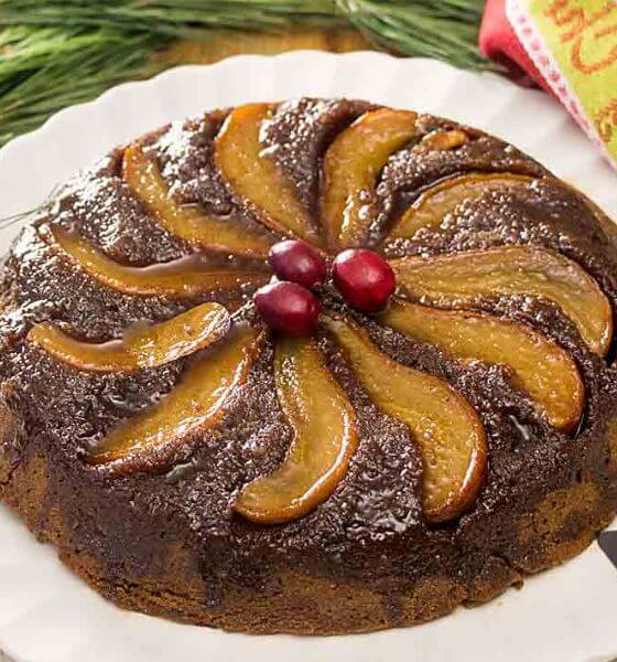 Gingerbread and Pear upside-down cake on white plate