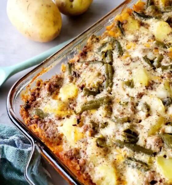 Ground beef and potato casserole in glass baking dish