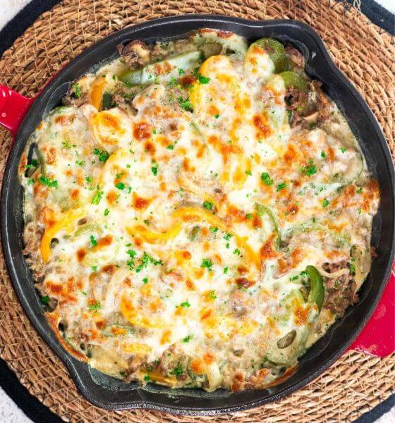 Cheesesteak casserole in black skillet