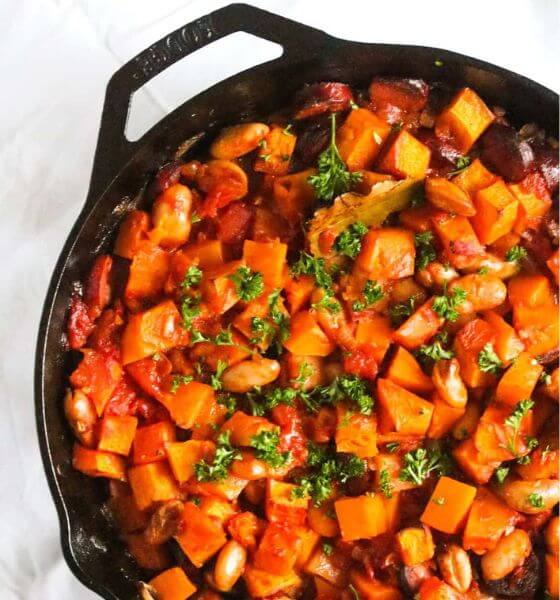 Butternut squash and potatoes in black pot