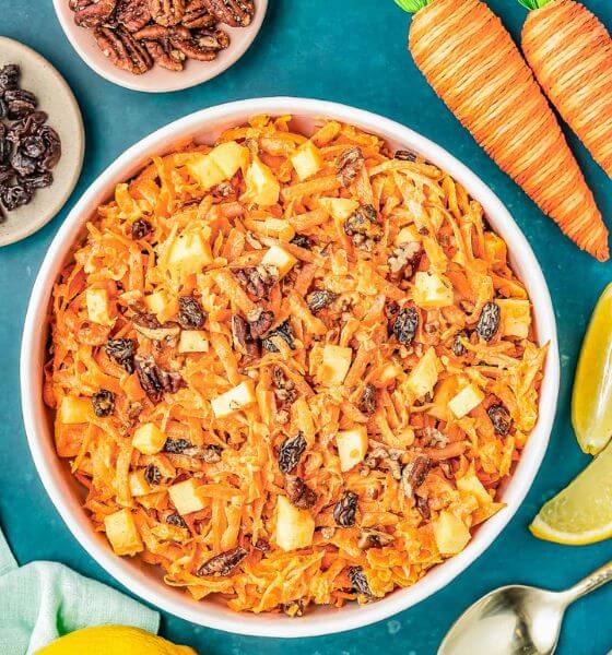 Carrot raisin salad in white bowl