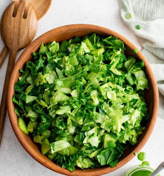 Green salad in wooden bowl for spring