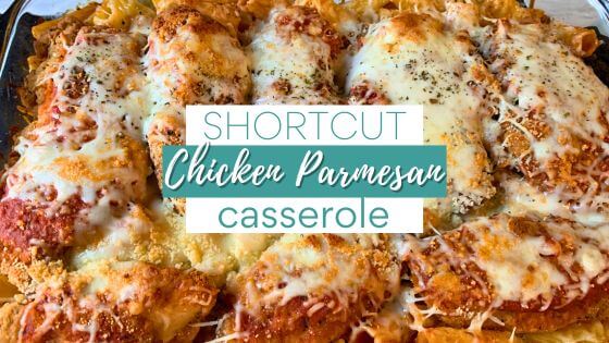 Chicken tenders with sauce, cheese and pasta in glass baking dish