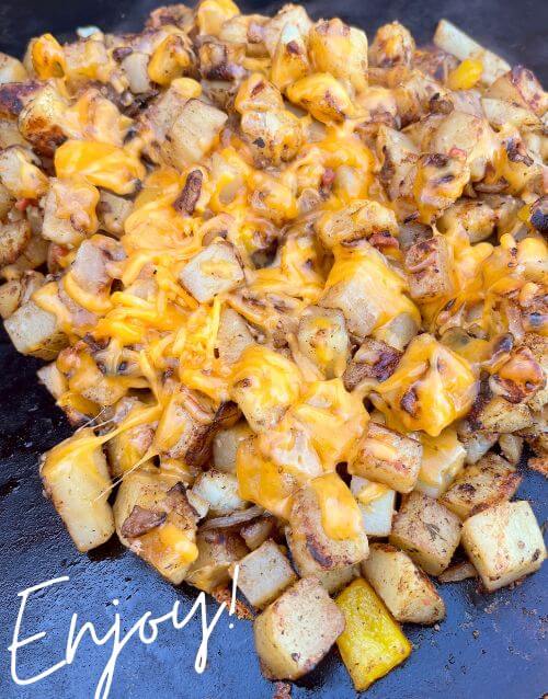 Potatoes with cheese and bacon cooked on the Blackstone