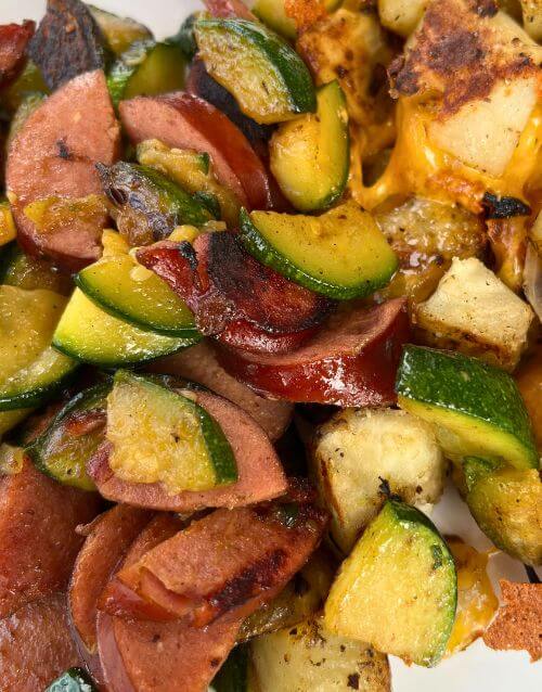 Kielbasa and zucchini cooked on Blackstone