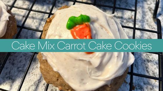 carrot cake cookies with frosting and a carrot on top
