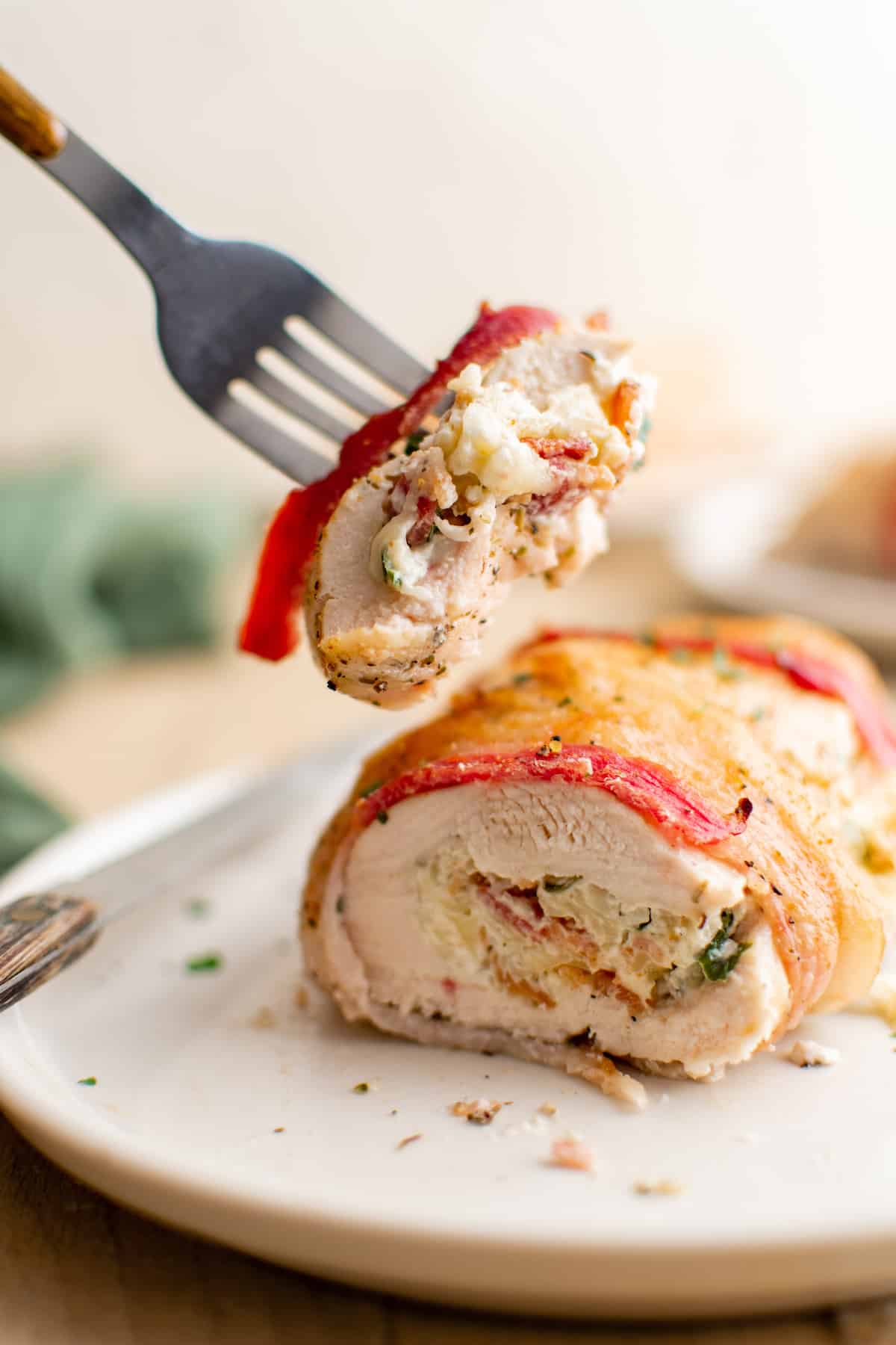 stuffed chicken on white plate