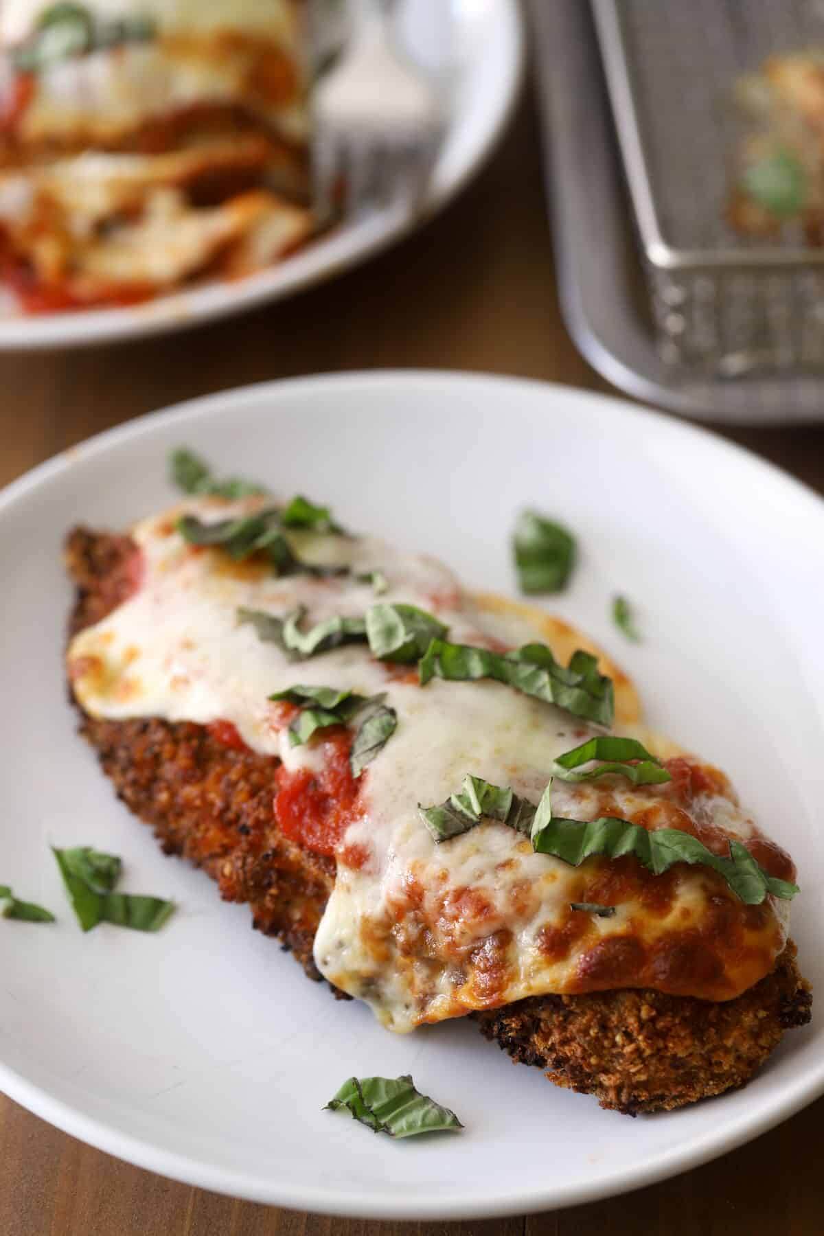 air fryer chicken parmesan on white plate