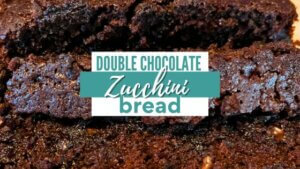 Sliced chocolate zucchini bread with text