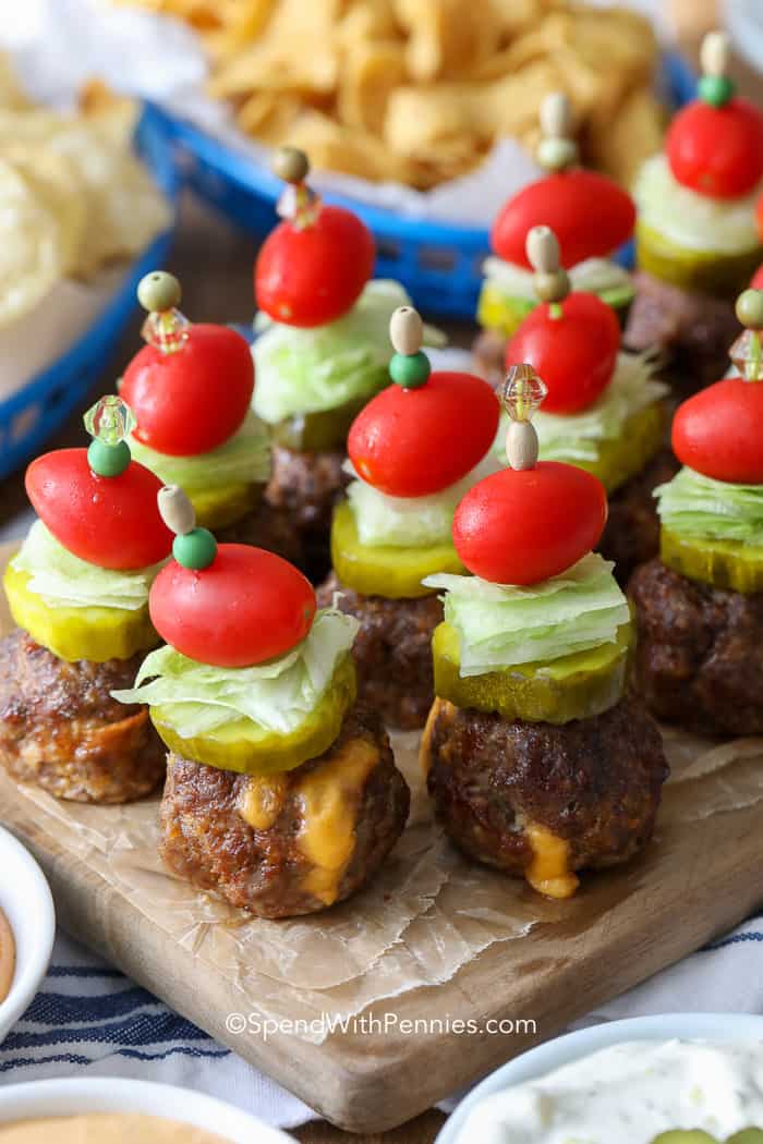 Cheeseburger meatballs on skewers with pickle and tomato